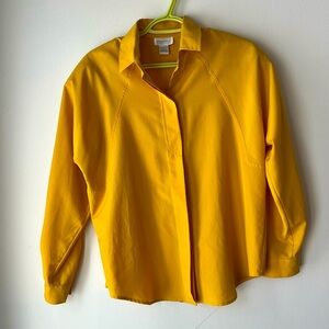 Bright yellow button down collared vintage women’s long sleeve shoulder pads